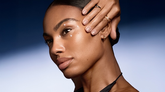 photo of model using eye cream to care for dynamic vs static lines