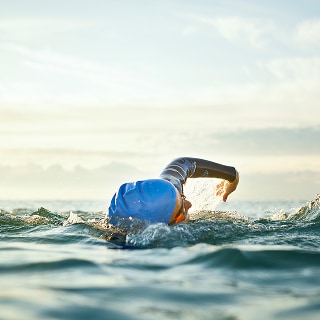 photo of person swimming for health and longevity